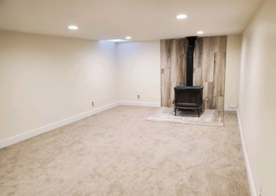 Spacious living room with no furniture